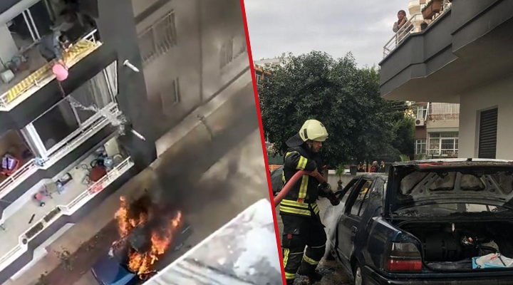 Yanan otomobili balkondan kovayla su dökerek söndürmeye çalıştı