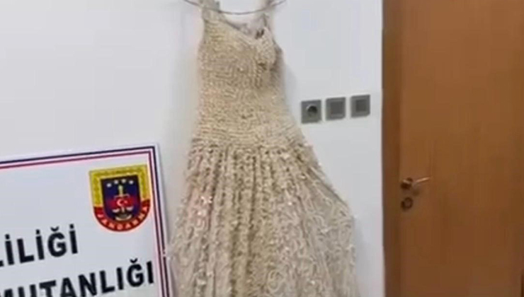 Gelinliğin üzerine boncuk şeklinde işlenmiş 25 kilo uyuşturucu ele geçirildi