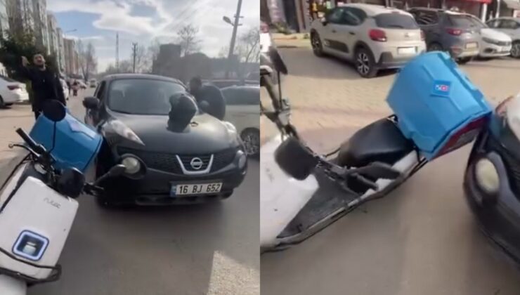 Otomobil sürücüsü ile motosikletli kurye arasındaki gerginlik kamerada